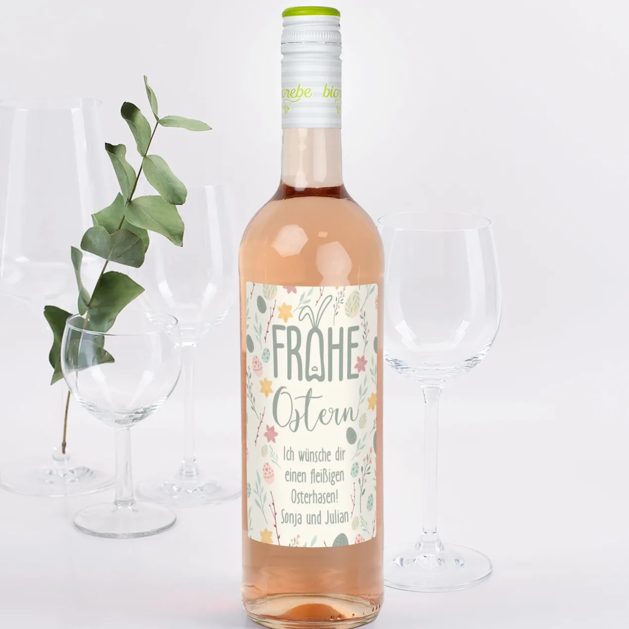 Biorebe Wein "Frohe Ostern" mit Wunschtext und pastellfarbenen Ostermotiven