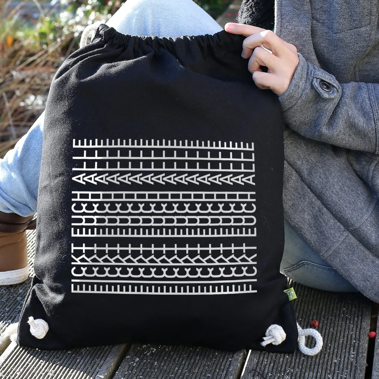 BIO Turnbeutel & Rucksack 'F*ckt euch alle' als lustiges Geschenk mit versteckter Botschaft in Schwarz
