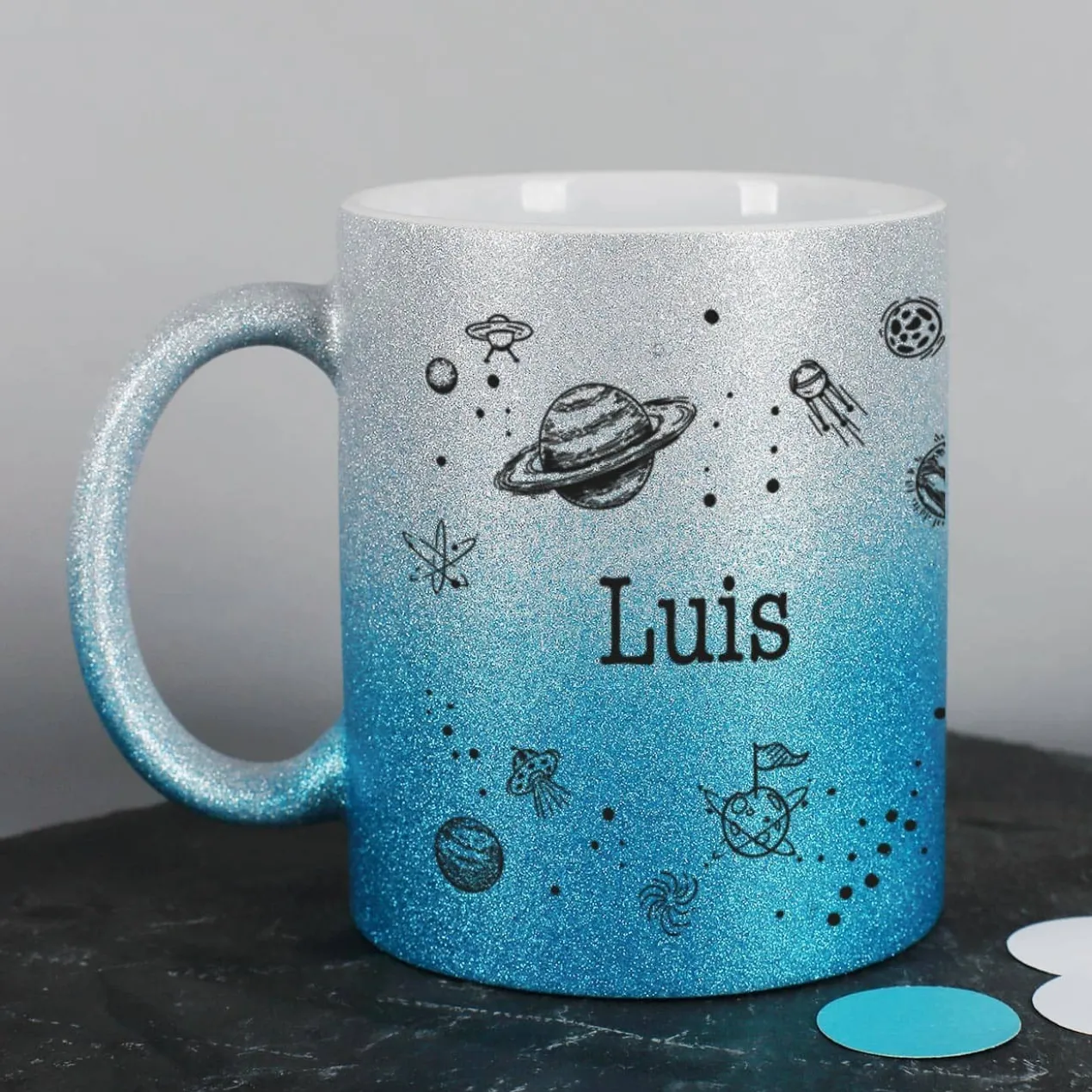 blaue Glitzertasse mit coolem Weltallmotiv