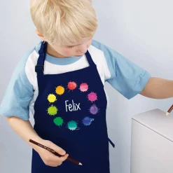 Dunkelblaue Kinderschürze mit Namensaufdruck und Farbklecks-Motiv