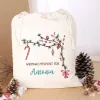 Festlicher Geschenksack mit Zweigen und Wunschtext