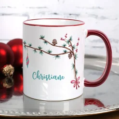 Festliche Weihnachtstasse mit Zweigen und Name
