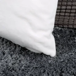 Flauschiges Kuschelkissen mit Dinos und Ihrem Wunschnamen