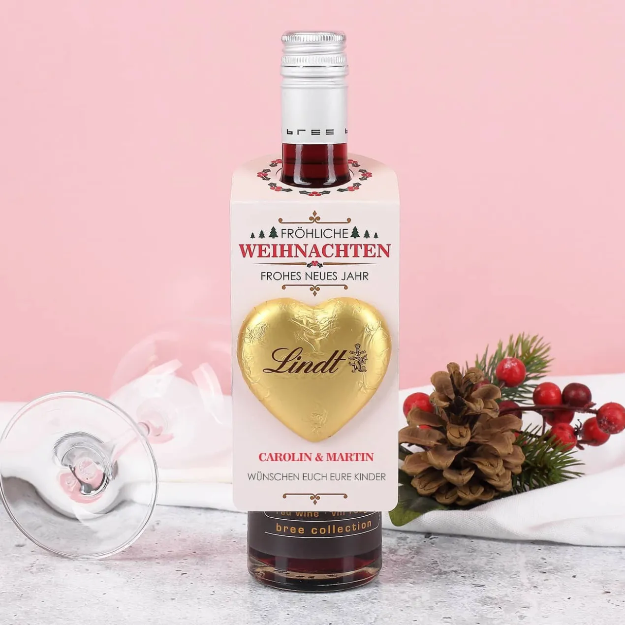 Fröhliche Weihnachten - Flaschenanhänger mit Lindt und Wunschname