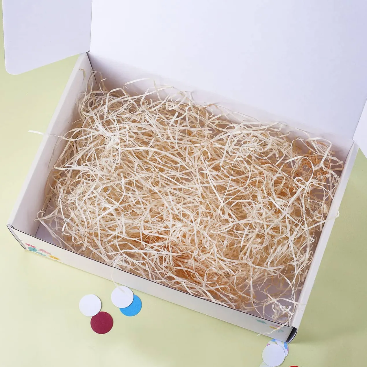 Frohe Ostern - Geschenkbox mit Hase, Blüten, Wunschtext und Holzwolle