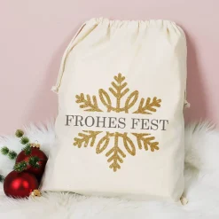 Geschenksack zu Weihnachten mit Schneeflocke in Goldoptik und Name bedruckt