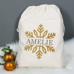 Geschenksack zu Weihnachten mit Schneeflocke in Goldoptik und Name bedruckt