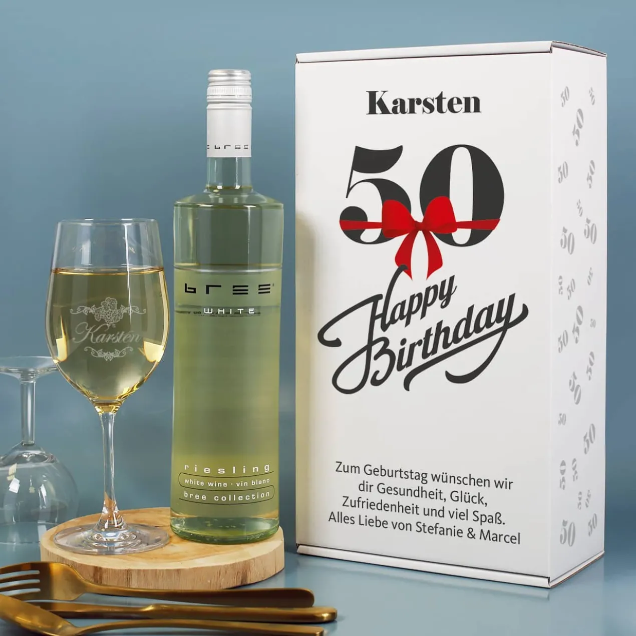 Geschenkset zum 50. Geburtstag mit graviertem Weinglas und Weinflasche in bedruckter Geschenkbox