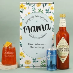 Geschenkset zum Muttertag mit graviertem Glas und blumiger Geschenkverpackung