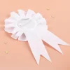 Glückwunsch-Rosette in weiß zum 20. Geburtstag