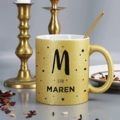 Goldene Glitzertasse mit Initiale und Name