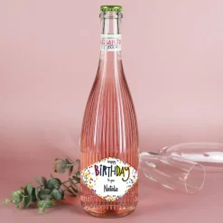 Happy Birthday - Fruchtsecco in zwei Sorten mit Ihrem Wunschnamen zum Geburtstag