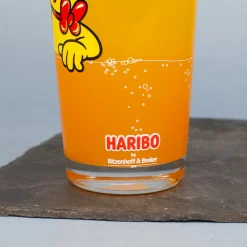 HARIBO Trinkglas Goldbär Motiv | 380 ml Glas in Orange oder Grün für Kinder, Erwachsene & Fans