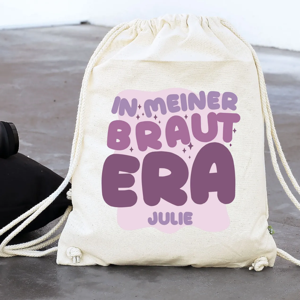 JGA Baumwoll-Rucksack mit Wunschname für die Braut-to-be | Schwarz & Natur