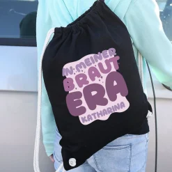JGA Baumwoll-Rucksack mit Wunschname für die Braut-to-be | Schwarz & Natur