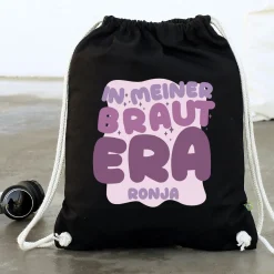 JGA Baumwoll-Rucksack mit Wunschname für die Braut-to-be | Schwarz & Natur