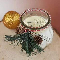 Kerze im Glas mit Weihnachtsdekoration - weiß oder rot
