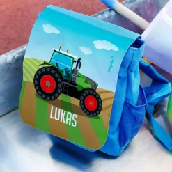 Kinderrucksack mit grünem Traktor und Name