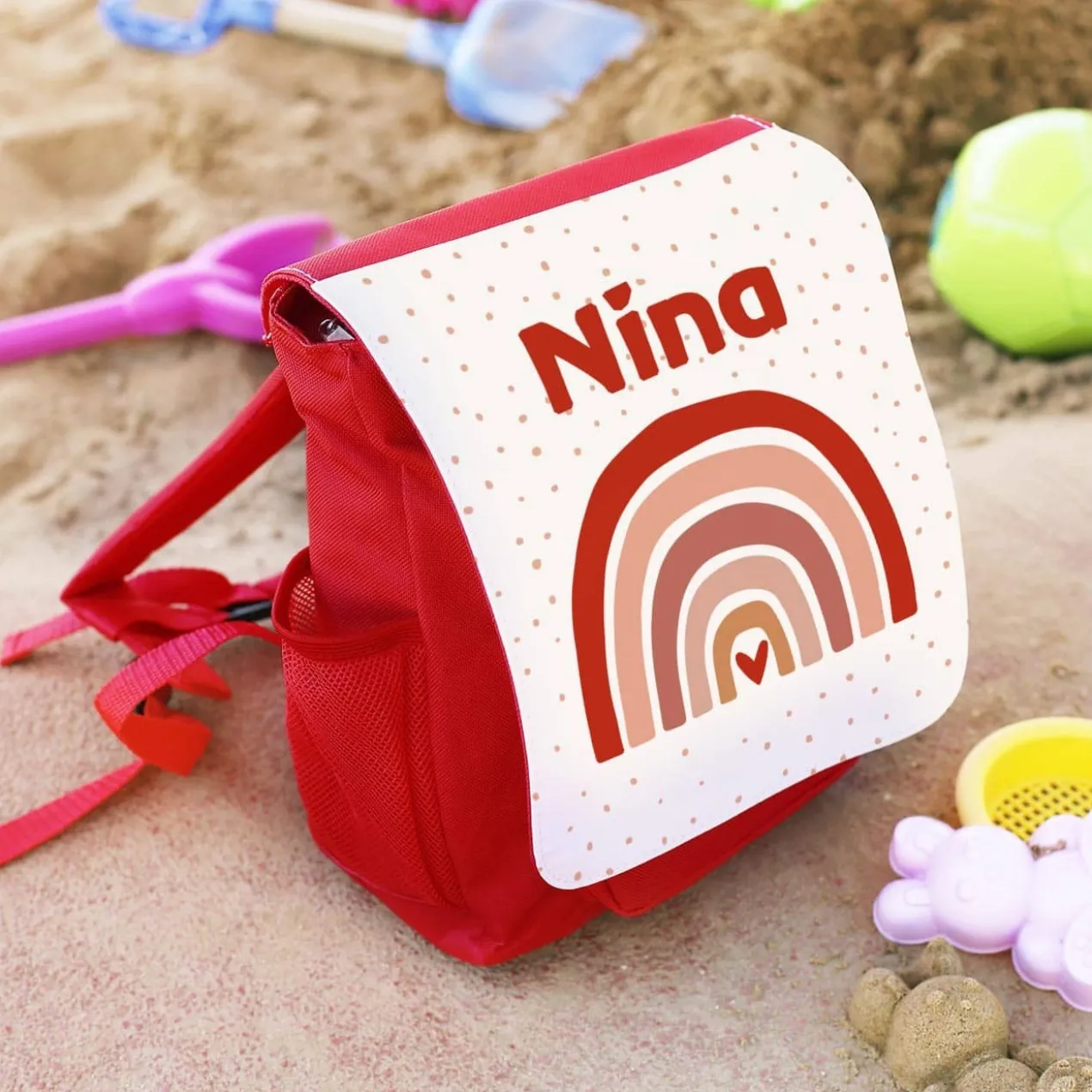 Kinderrucksack mit Regenbogenmotiv und Namensaufdruck