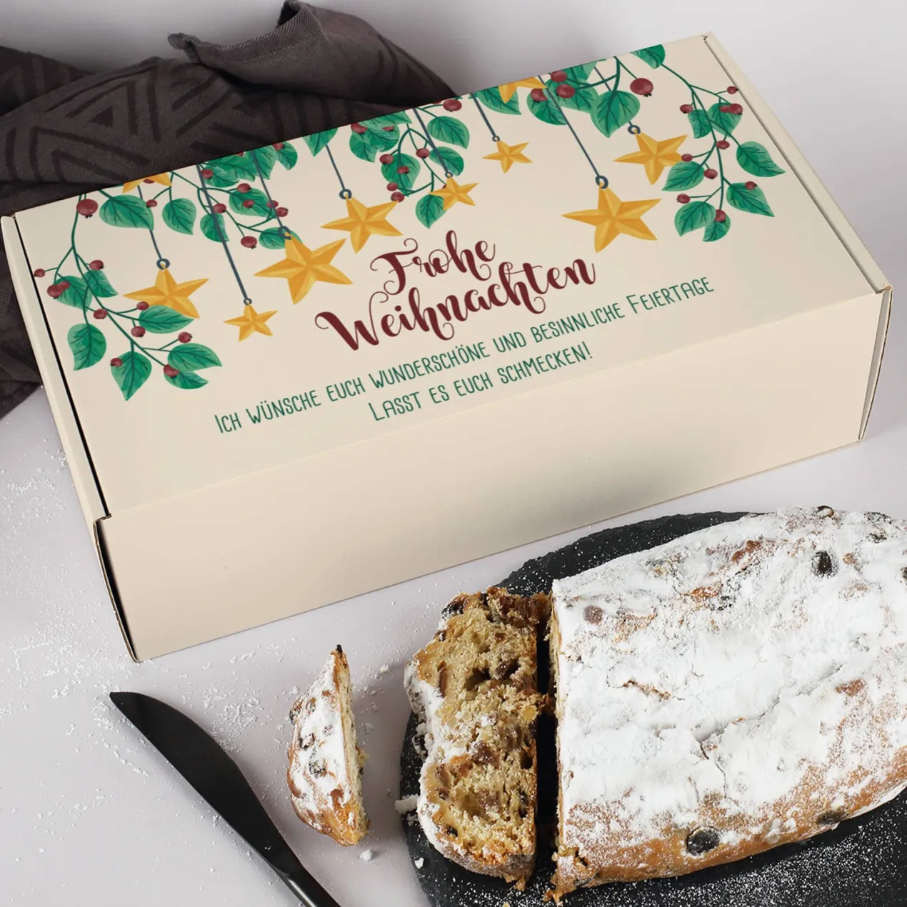 Leckerer Rosinenstollen als Weihnachtsgeschenk mit personalisierbarer Geschenkverpackung