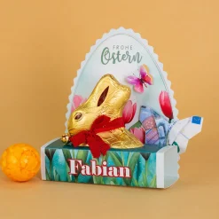 Lindt Goldhase in personalisierter Osterverpackung mit Wunschname "Frohe Ostern"