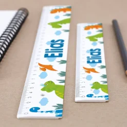 Lineal mit Dinosaurier Motiv und Namensaufdruck