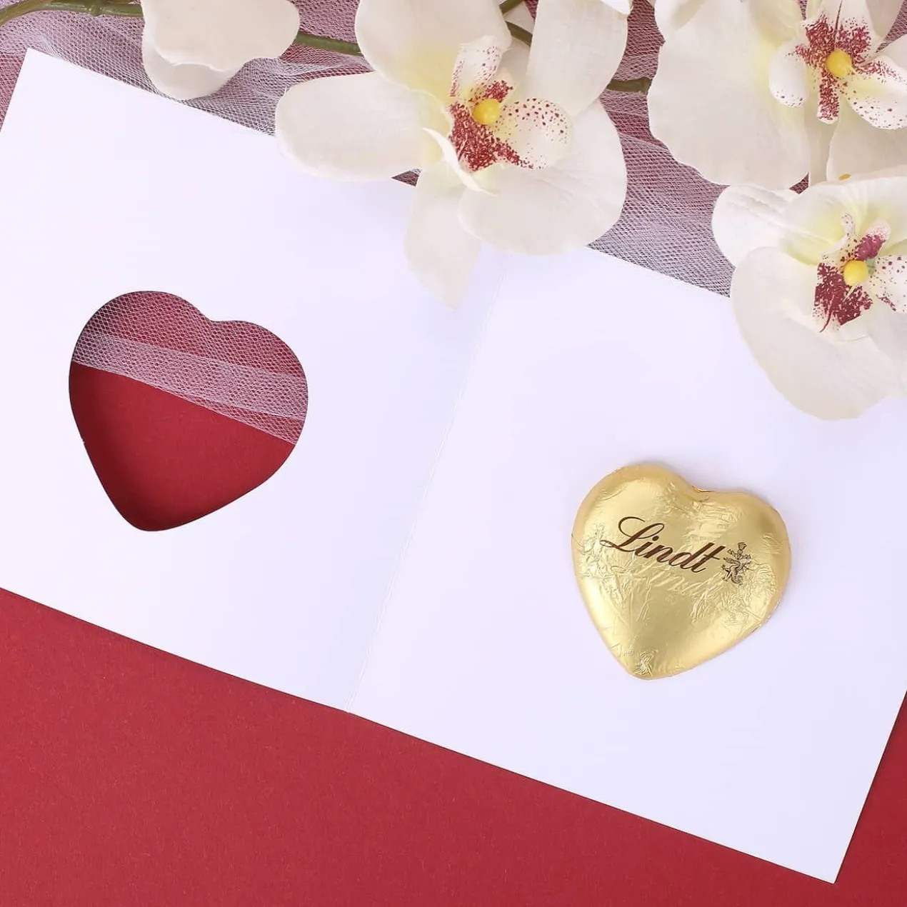 Love is in the air - Klappkarte mit Lindt Schokoherz