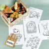 Osternest für Kinder mit Ausmalbildern, Buntstiften und Schokolade