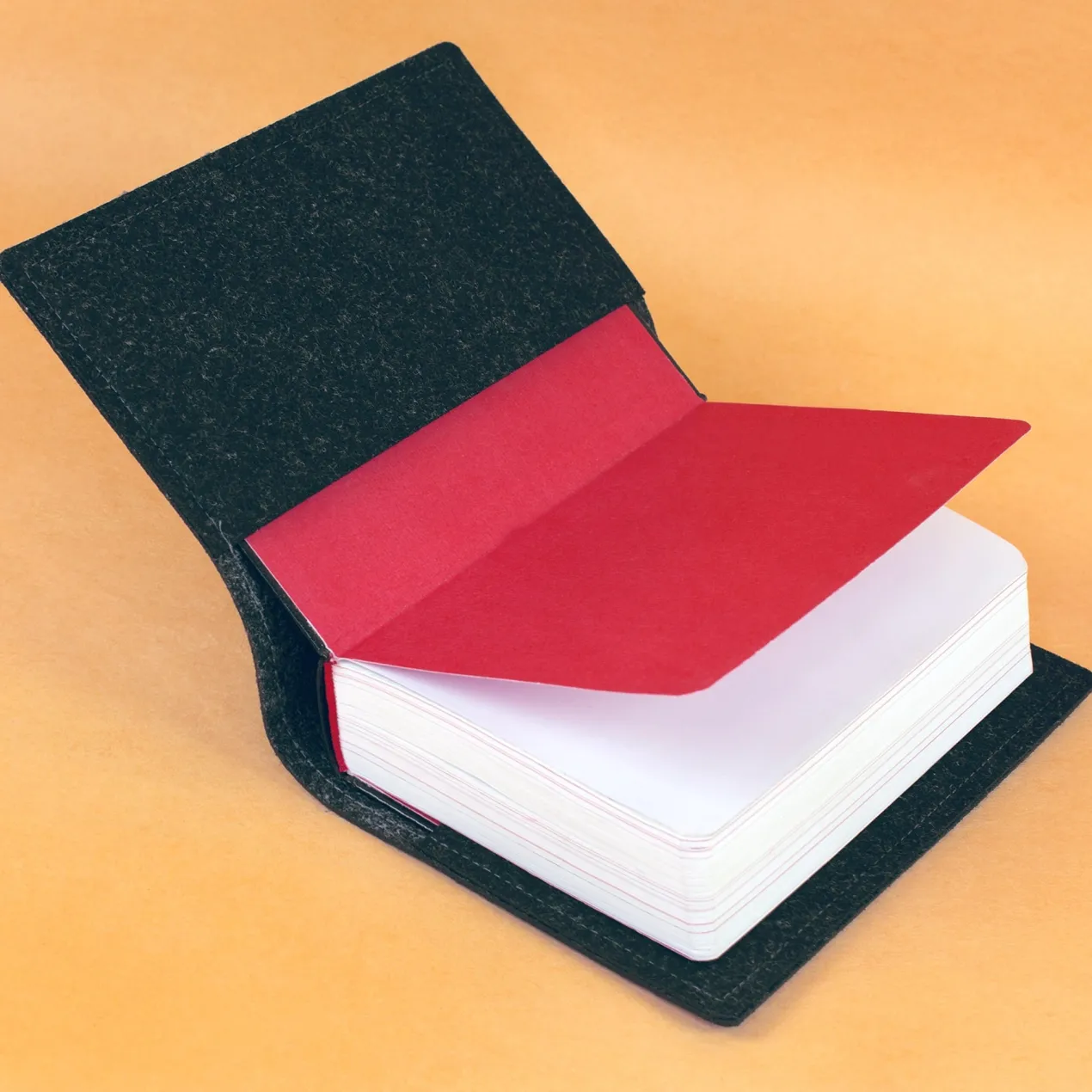 Personalisierte Buchhülle für Gotteslob & Gesangbuch mit Watercolor Kreuz | Anthrazit oder Orange