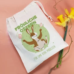 Personalisierter Geschenksack zu Ostern „Fröhliche Ostern“ mit jonglierendem Osterhasen