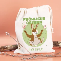 Personalisierter Geschenksack zu Ostern „Fröhliche Ostern“ mit jonglierendem Osterhasen