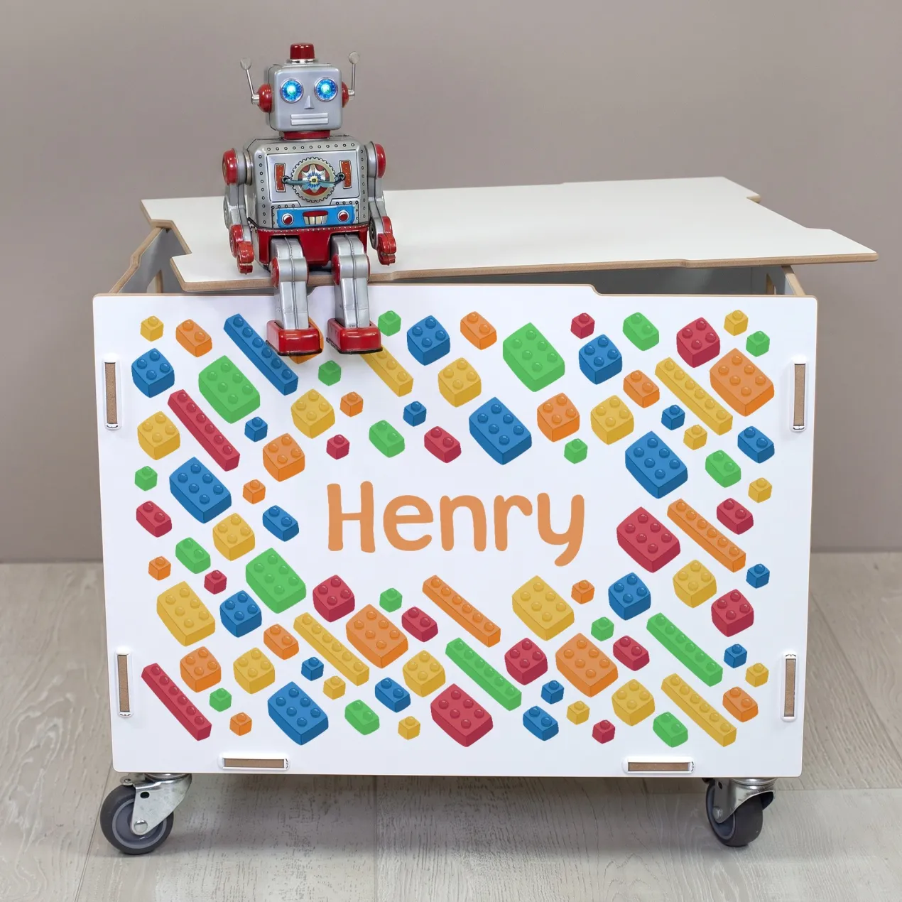 Personalisierte Rollbox aus Holz von clipfritz - Bunte Bausteinwelt | Kinder-Spielzeugkiste mit Name