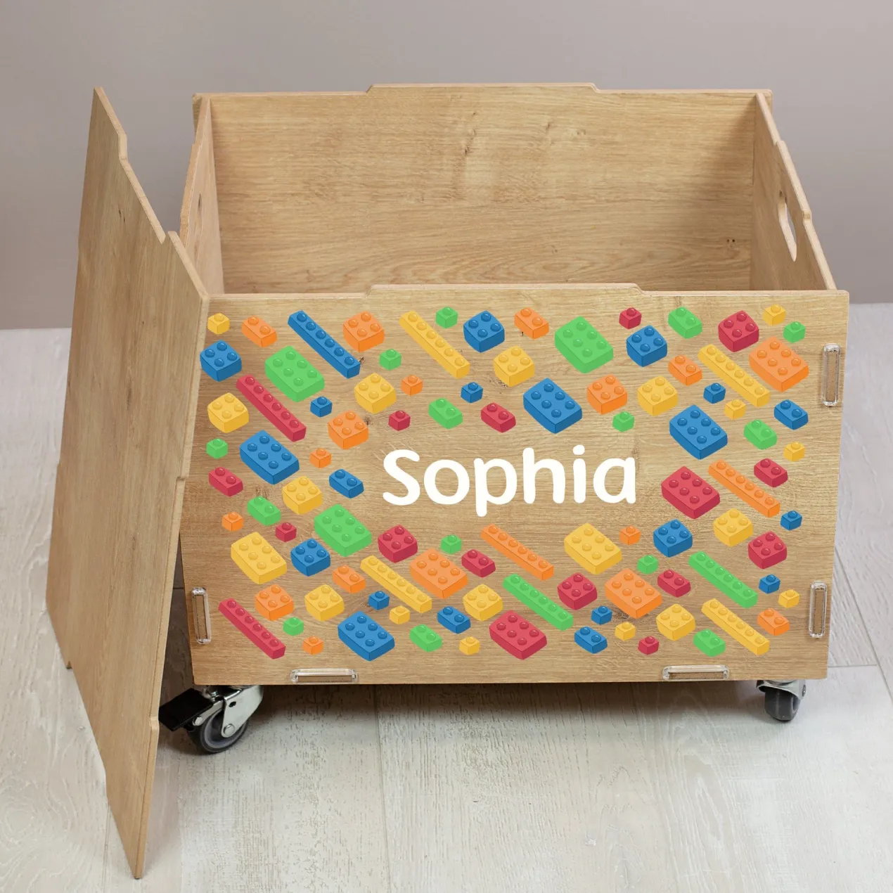 Personalisierte Rollbox aus Holz von clipfritz - Bunte Bausteinwelt | Kinder-Spielzeugkiste mit Name