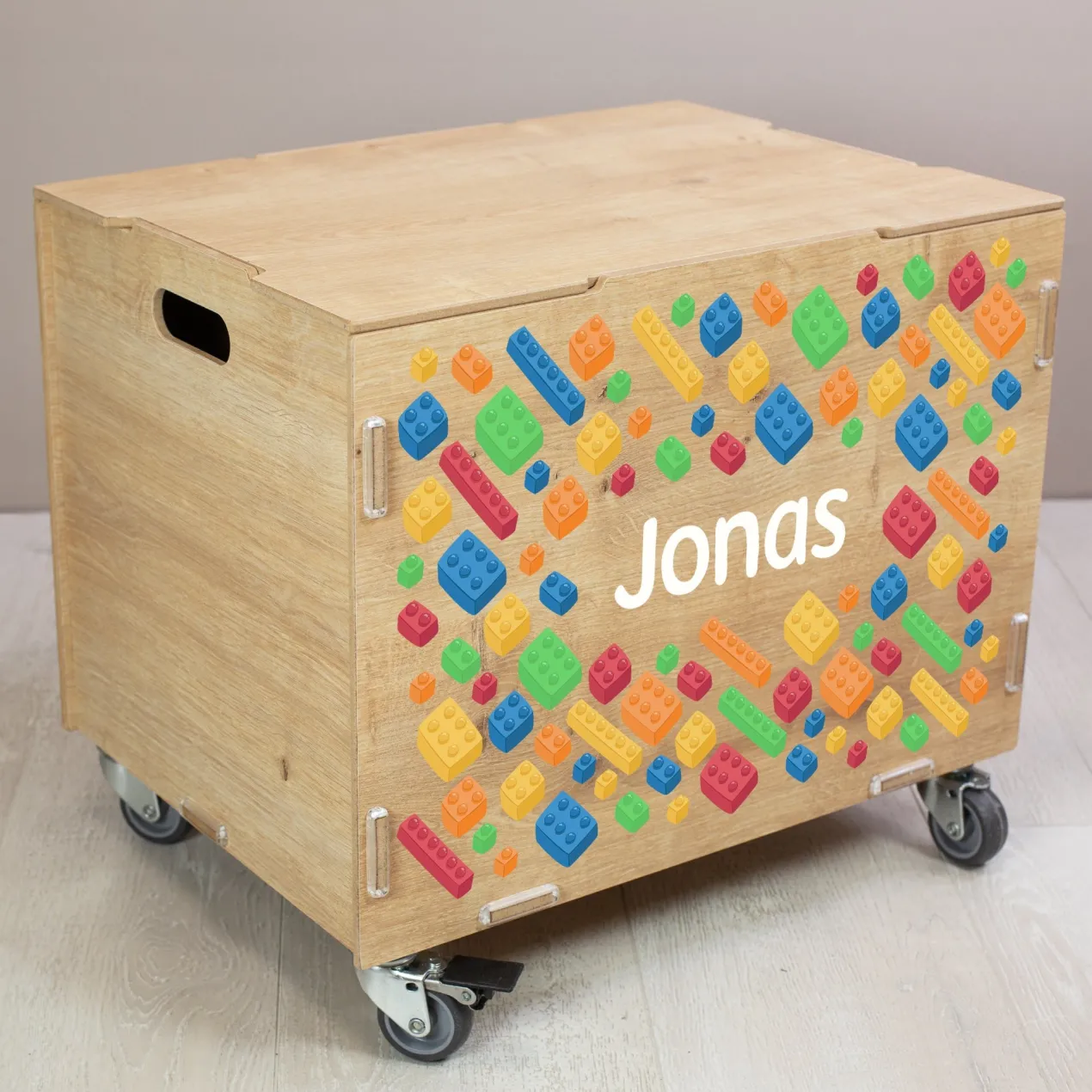 Personalisierte Rollbox aus Holz von clipfritz - Bunte Bausteinwelt | Kinder-Spielzeugkiste mit Name