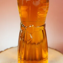 Personalisiertes Bierglas mit Name im Design einer Lederhose oder Dirndl und Lebkuchenherz Motiv