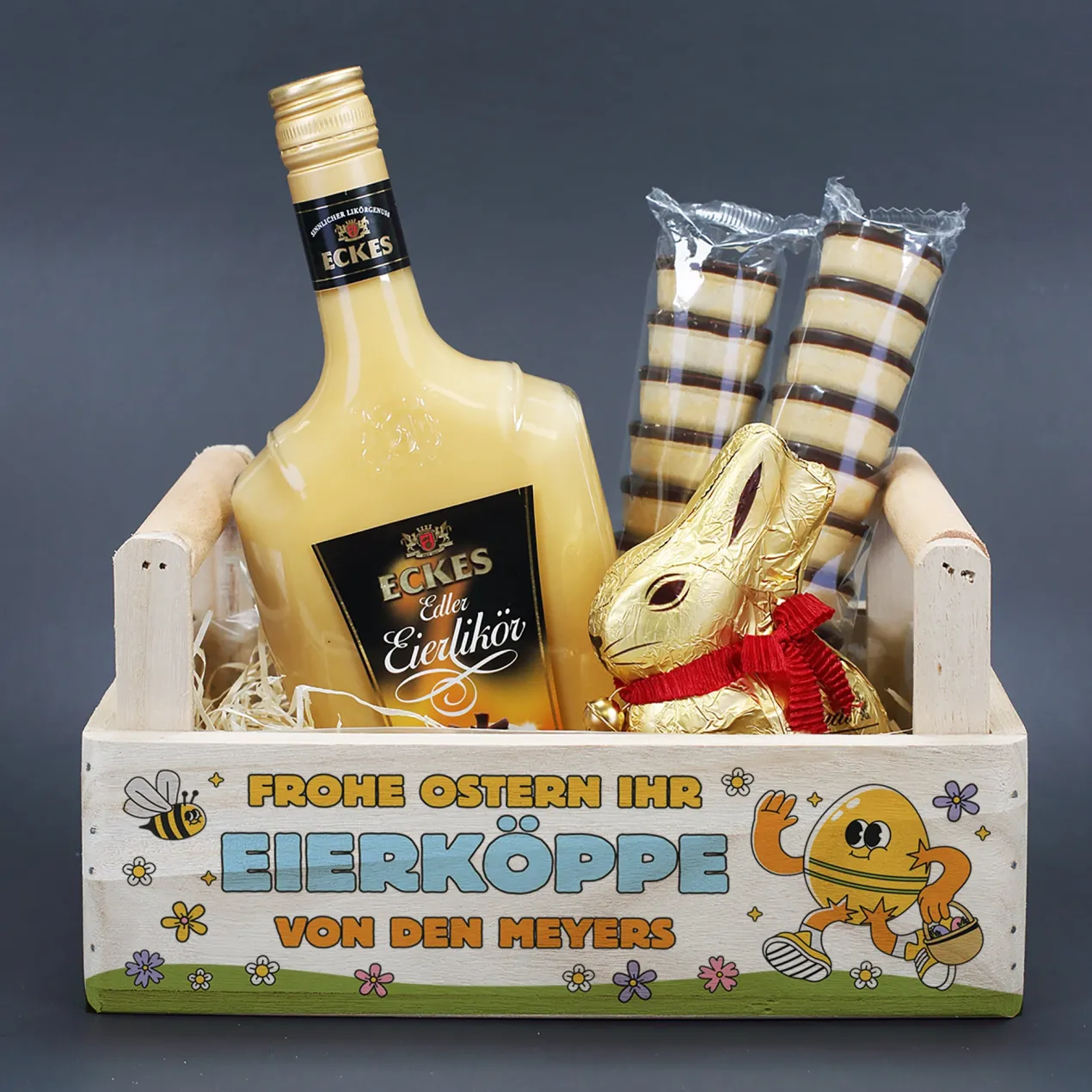 Personalisiertes Geschenkset zu Ostern mit Lindt Goldhase & Eierlikör im Holzkorb 'ihr Eierköppe'