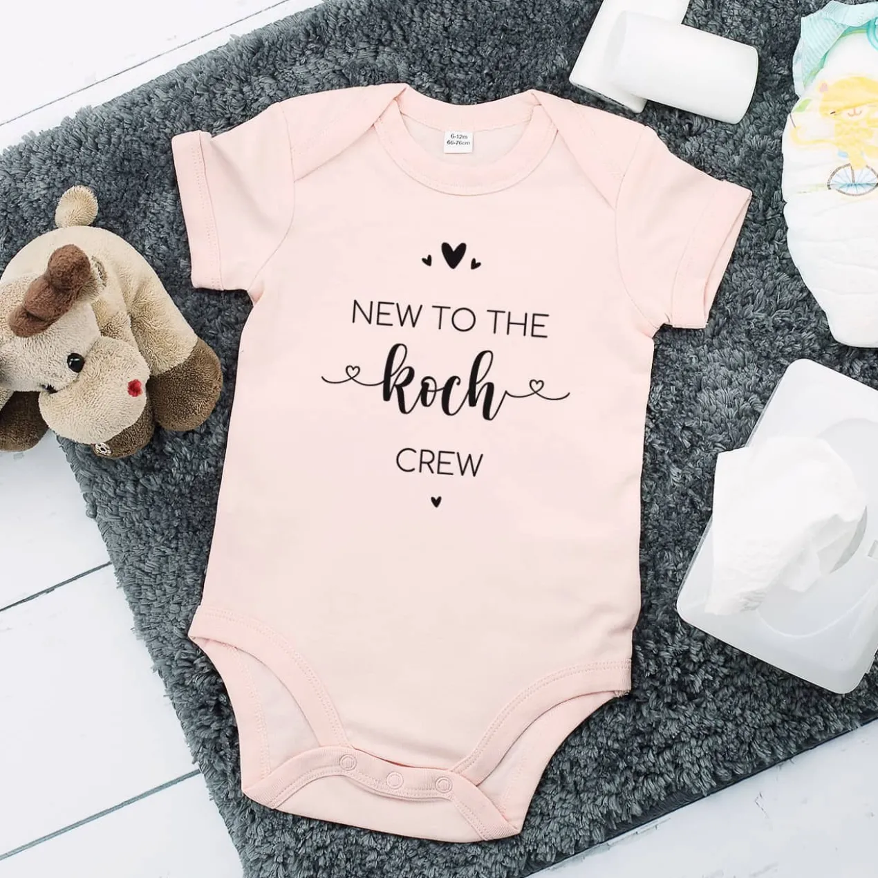 Rosa Babybody -New to the Crew- persönlich bedruckt