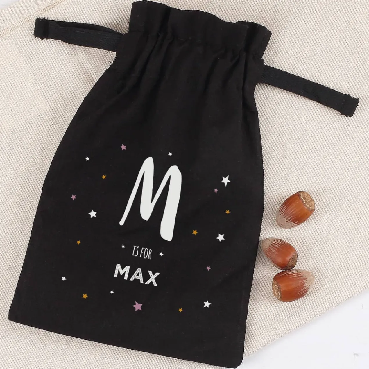 Schokokugeln im Geschenksack mit Name und Initiale