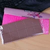 Schokolade in der Clutch - ein beliebtes Geschenk für Frauen