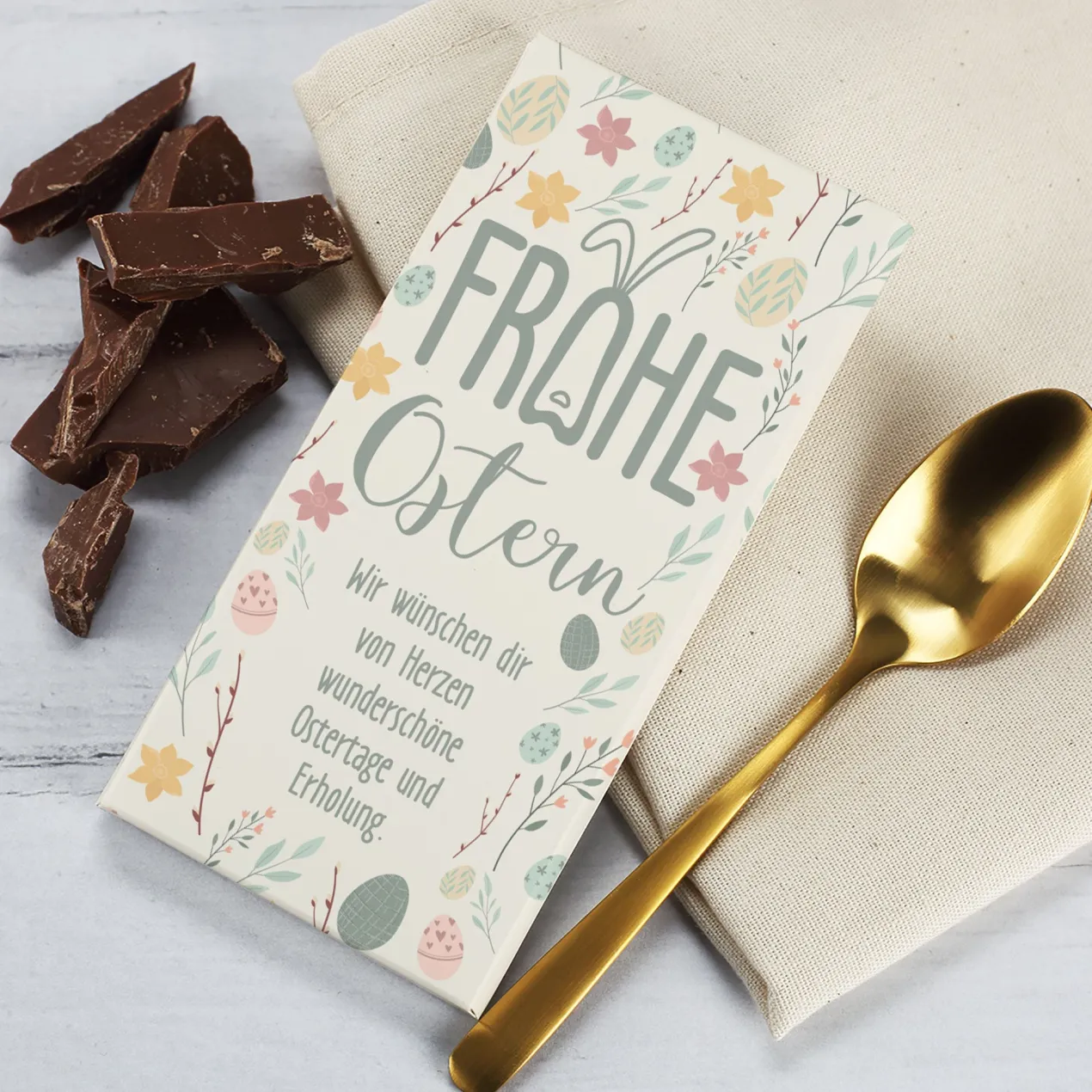 Schokoladentafel zu Ostern mit Wunschtext und pastellfarbenen Motiven | 100g