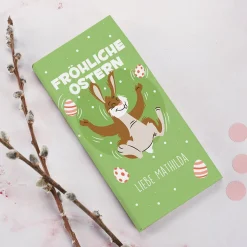 Schokolade zu Ostern mit Wunschtext und fröhlichem Osterhasenmotiv