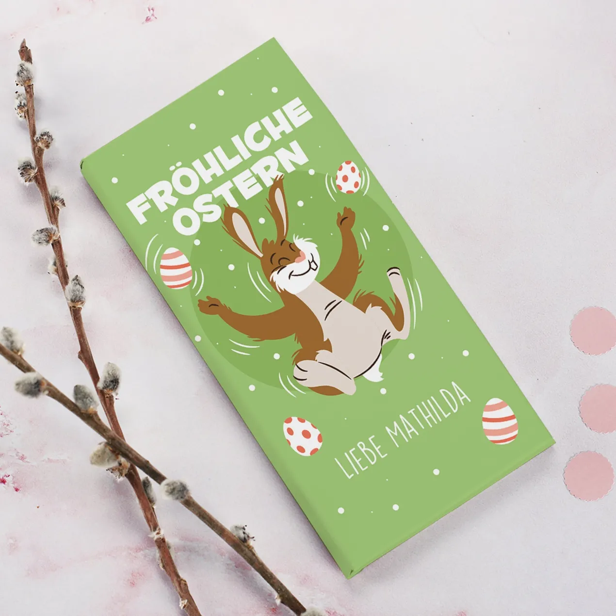 Schokolade zu Ostern mit Wunschtext und fröhlichem Osterhasenmotiv