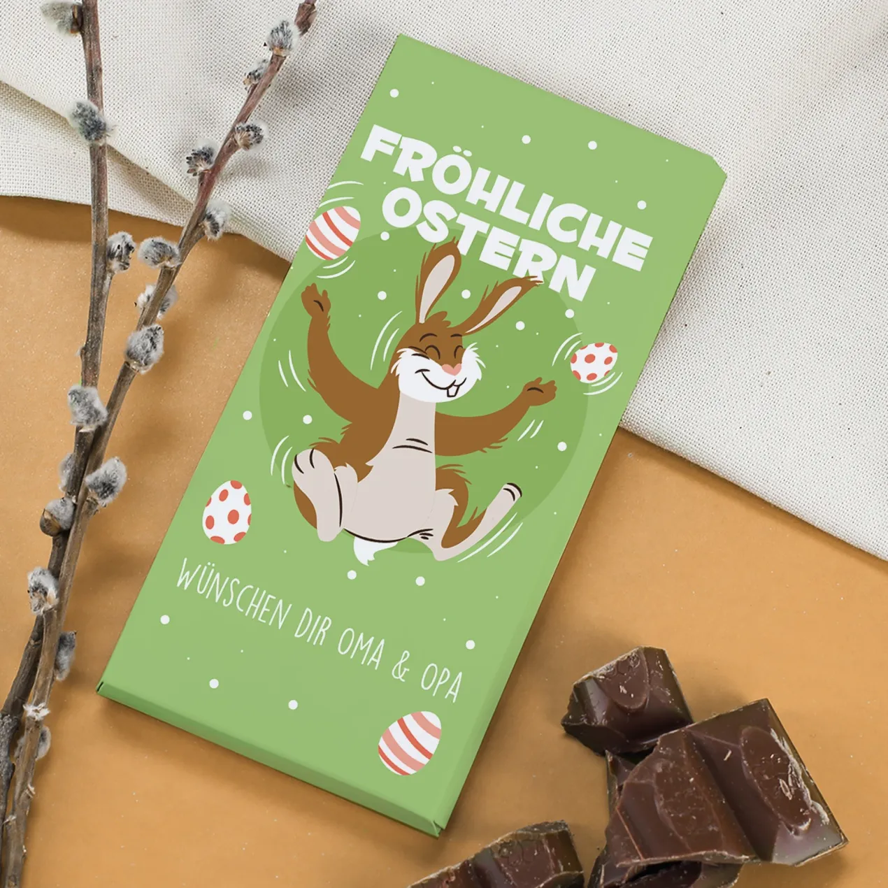 Schokolade zu Ostern mit Wunschtext und fröhlichem Osterhasenmotiv