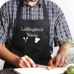 Schürze mit Ihren Wunschtexten und Kochsymbolen bedruckt