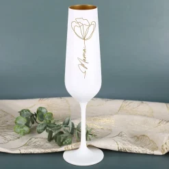 Sektglas mit Line Art Blume und Namensgravur im Blütenstiel