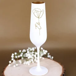 Sektglas mit Line Art Blume und Namensgravur im Blütenstiel