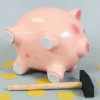 Spardose - Schwein mit Hammer