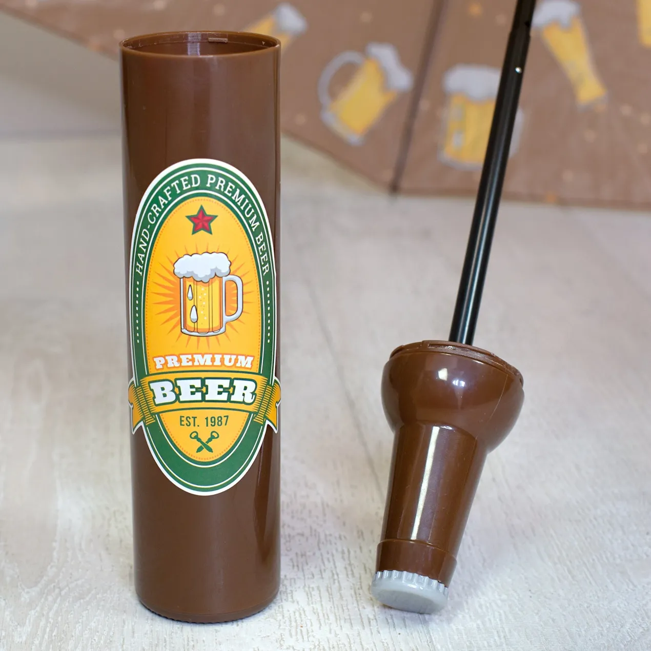 Taschen Regenschirm als Bierflasche