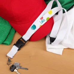 Weißes Schlüsselband mit buntem Motiv und Name