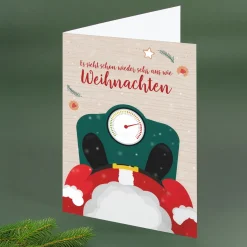 Weihnachtskarte personalisiert mit Fotos & Wunschtext | Weihnachtsmann auf Waage Motiv